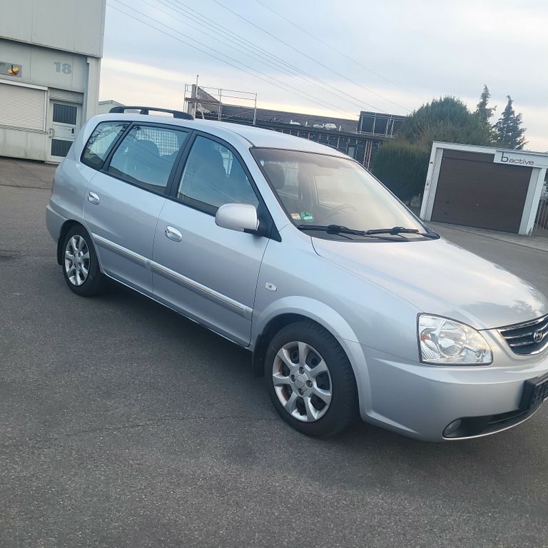 Silber Gebraucht 2006 Kia Carens EX Van / Kleinbus | 3.399 € (Fairer Preis) - Bild 1/4