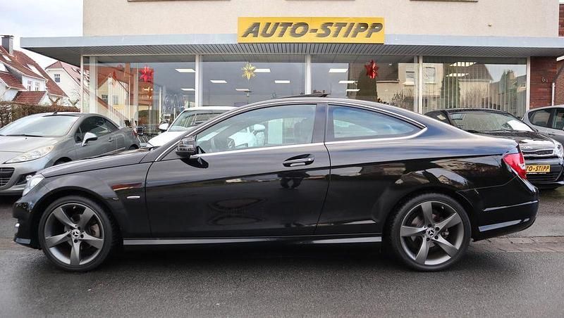 Gebraucht Mercedes C180 AMG 156 PS (114 kW) 2015 Obsidianschwarz (metallic) Coupé