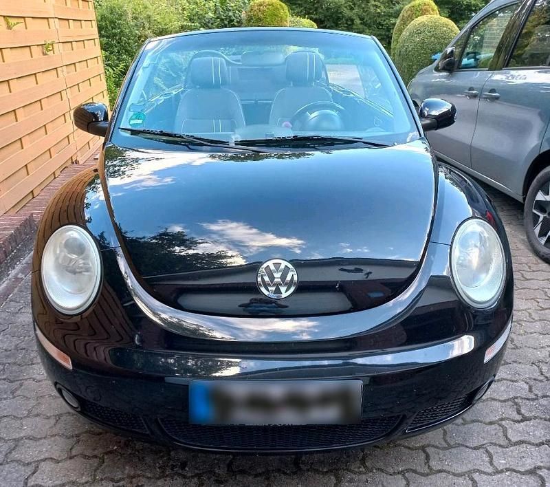 Gebraucht VW New Beetle 102 PS (75 kW) 2010 Schwarz Kleinwagen