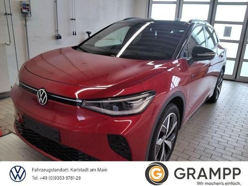 Kings red metallic schwarz Gebraucht 2025 VW ID.4 GTX SUV | 44.490 € - Bild 1/3