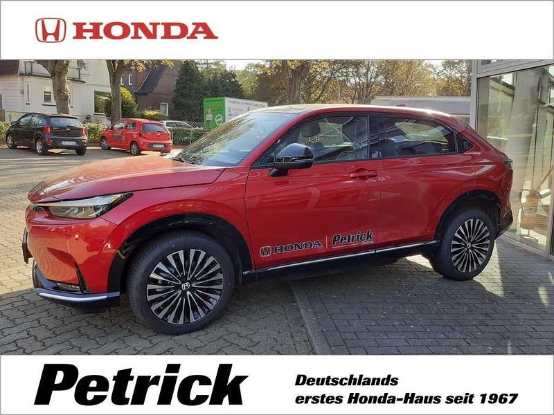 Vermillion red (metallic) Gebraucht 2023 Honda e:Ny1 Advance SUV | 26.990 € (Guter Preis) - Bild 1/4