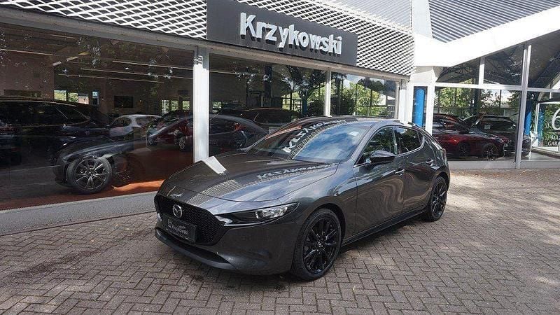 Machine gray Neu 2025 Mazda 3 Homura-Line Limousine | 26.990 € - Bild 1/4