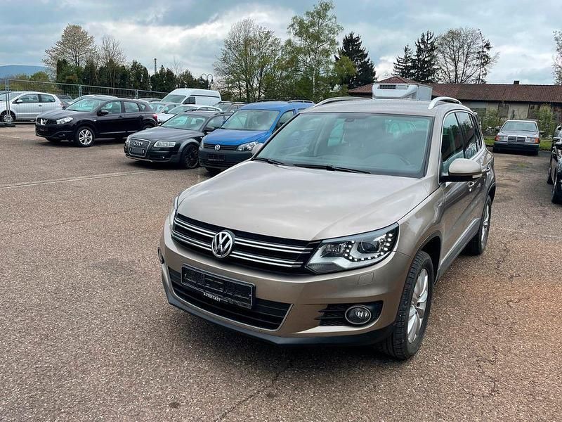 Beige Gebraucht 2012 VW Tiguan Sportline SUV | 11.599 € (Fairer Preis) - Bild 1/4