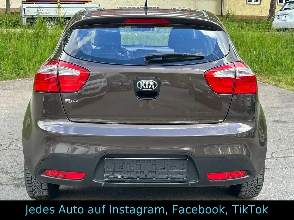 Gebraucht Kia Rio Attract 86 PS (63 kW) 2013 Braun Kleinwagen