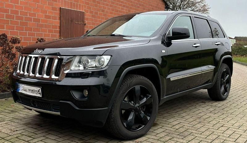 Schwarz Gebraucht 2012 Jeep Grand Cherokee Overland SUV | 15.500 € (Teuer) - Bild 1/4