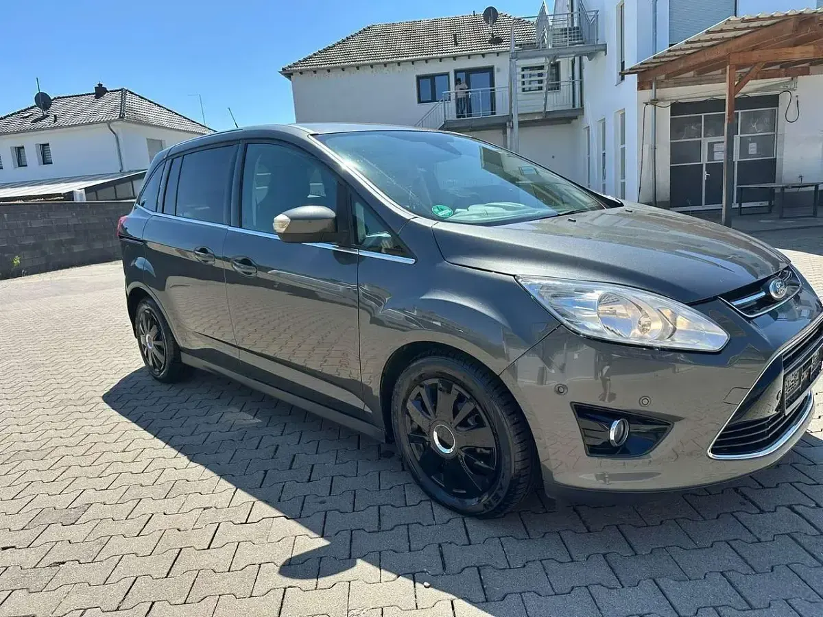 Gebraucht Ford Grand C-Max Titanium 116 PS (85 kW) 2015 Magneticgrau (metallic) Van / Kleinbus
