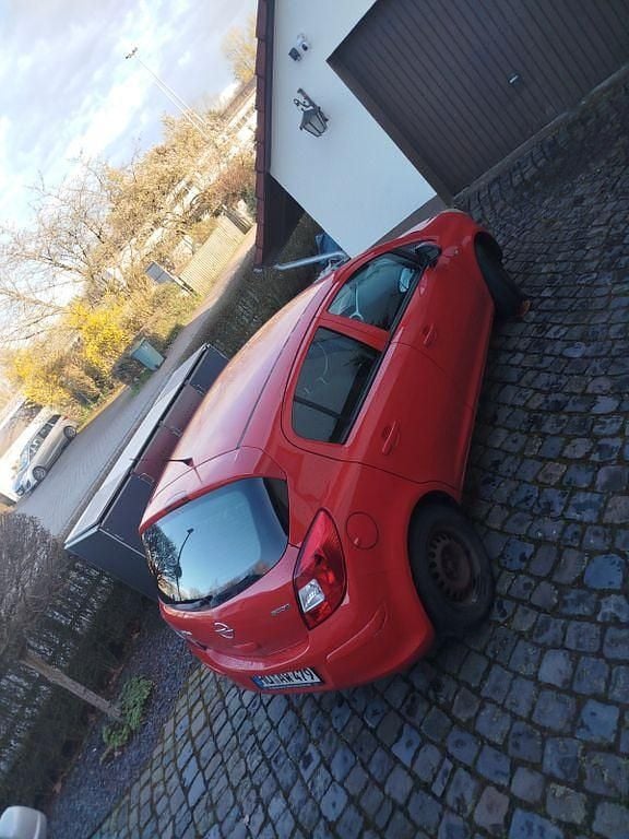 Gebraucht Opel Corsa 60 PS (44 kW) 2009 Rot Kleinwagen