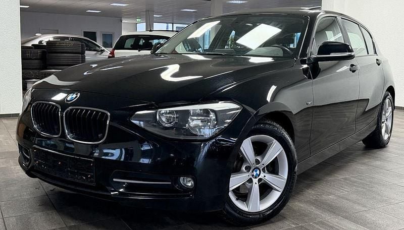 Schwarz Gebraucht 2013 BMW 118 Sport Line Kleinwagen | 7.240 € (Fairer Preis) - Bild 1/4