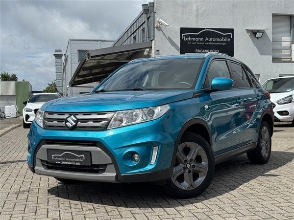 Grün Gebraucht 2015 Suzuki Vitara Comfort+ SUV | 10.950 € (Fairer Preis) - Bild 1/4