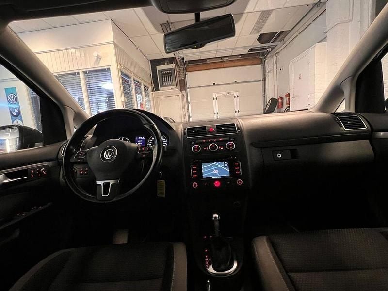 Second-hand VW Touran Highline 105 CP (77 kW) 2013 Gri Monovolum
