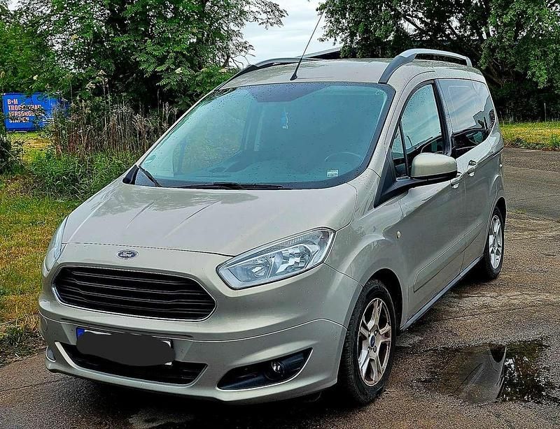 Grau Gebraucht 2014 Ford Tourneo Courier Trend Van / Kleinbus | 7.150 € (Fairer Preis) - Bild 1/4
