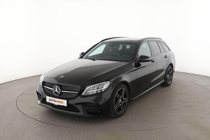 Schwarz Gebraucht 2021 Mercedes C180 AMG line Kombi | 27.040 € (Guter Preis) - Bild 1/3
