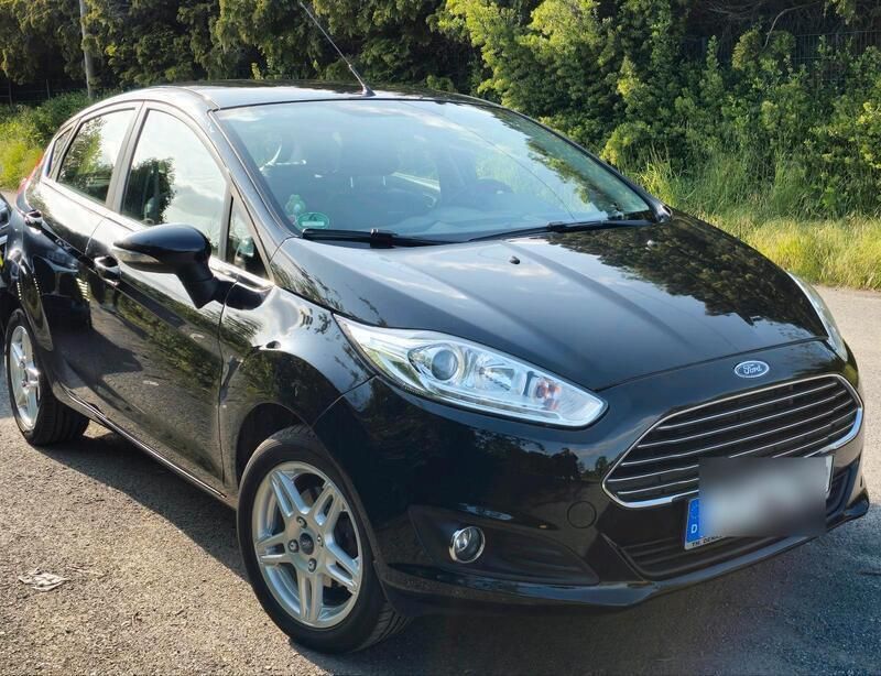Schwarz Gebraucht 2013 Ford Fiesta Titanium Kleinwagen | 4.600 € (Fairer Preis) - Bild 1/4
