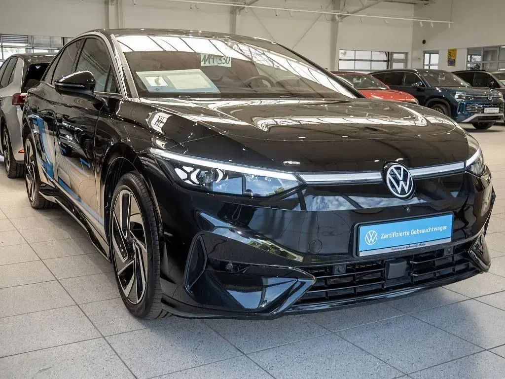 Gebraucht VW ID.7 Pro 210 kW (286 PS) 2023 Grenadillschwarz metallic Kleinwagen