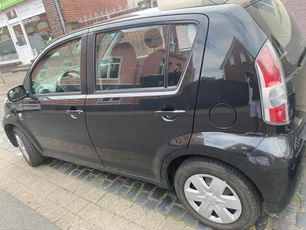 Gebraucht Daihatsu Sirion 71 PS (52 kW) 2007 Schwarz Kleinwagen