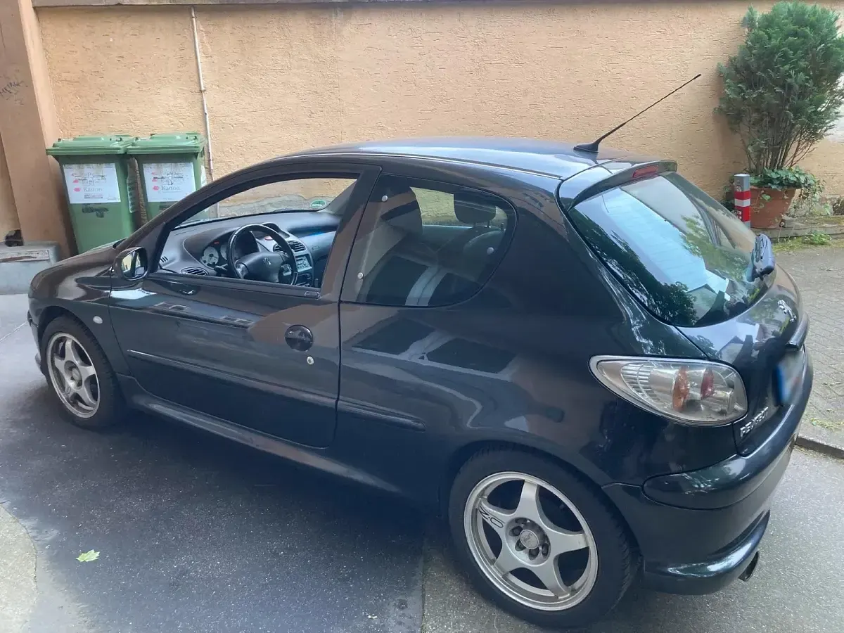 Używany Peugeot 206 75 KM (55 kW) 2003 Szary Hatchback