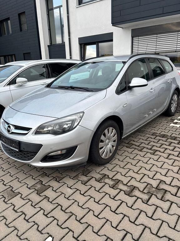 Silber Gebraucht 2015 Opel Astra Edition Kombi | 8.399 € (Fairer Preis) - Bild 1/4
