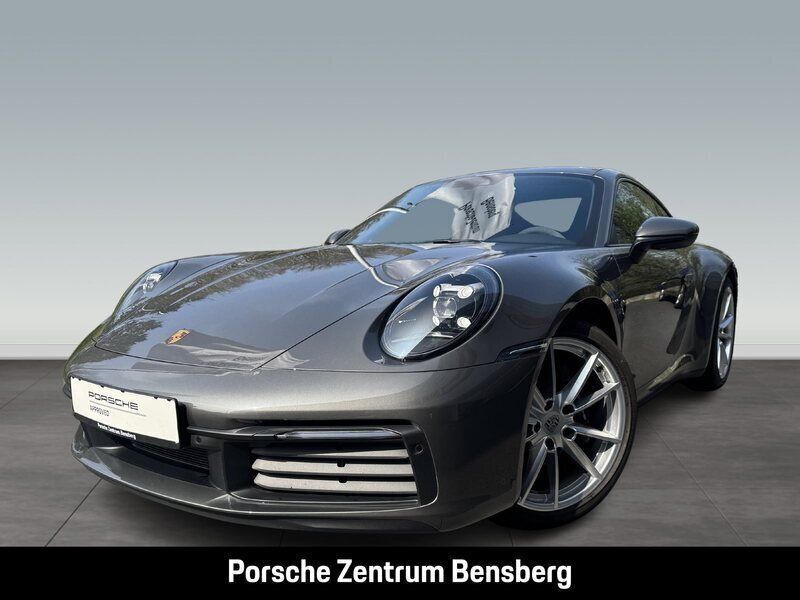 Grau Gebraucht 2024 Porsche 911 Carrera Coupé | 128.900 € (Fairer Preis) - Bild 1/4