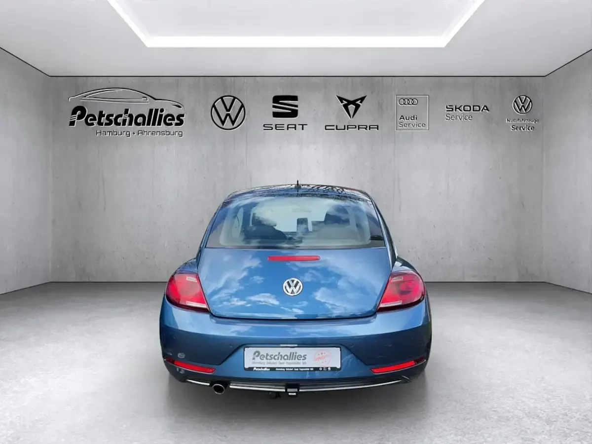 Używany VW Beetle Design 105 KM (77 kW) 2017 Niebieski Hatchback
