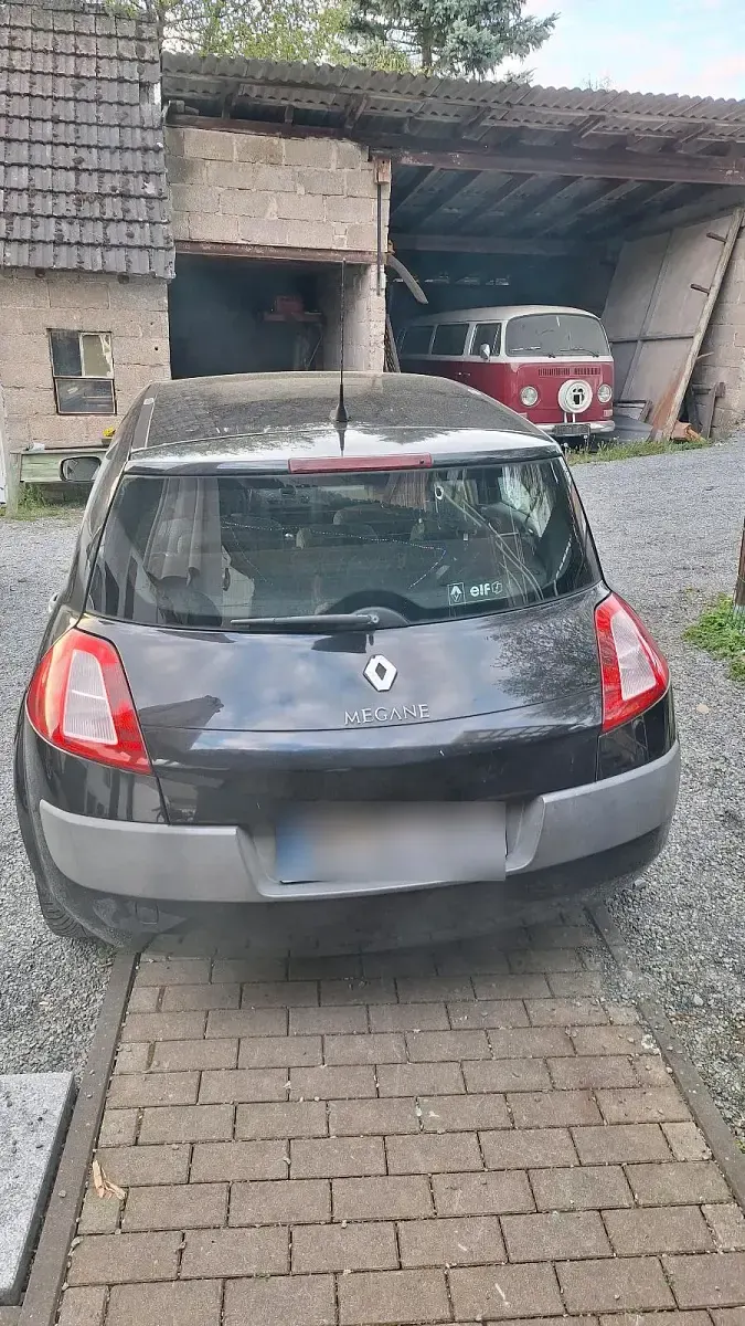 Używany Renault Mégane 110 KM (80 kW) 2004 Czarny Sedan/Limuzyna