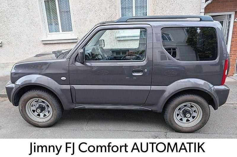 Grau Gebraucht 2015 Suzuki Jimny Comfort SUV | 18.390 € (Fairer Preis) - Bild 1/4