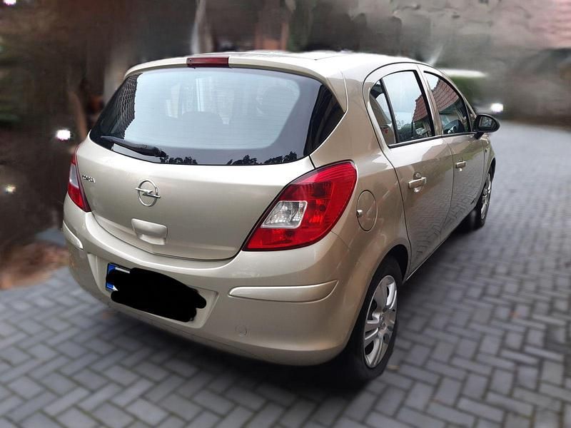 Second-hand Opel Corsa 60 CP (44 kW) 2009 Auriu Hatchback