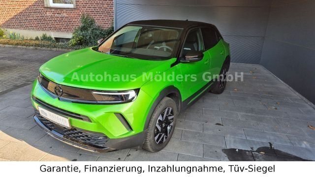 Grün matchagreenmetallic metallic Gebraucht 2024 Opel Mokka GS Line SUV | 23.950 € (Fairer Preis) - Bild 1/4