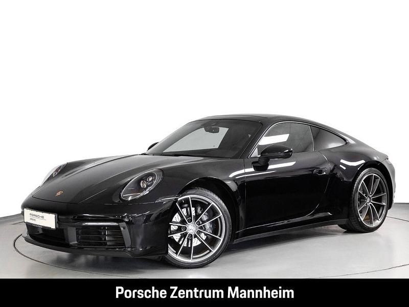 Tiefschwarzmetallic Gebraucht 2022 Porsche 911 Carrera Coupé | 122.900 € (Fairer Preis) - Bild 1/4