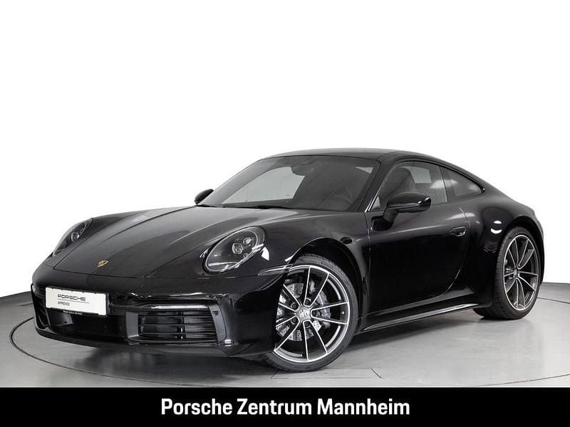 Tiefschwarzmetallic Gebraucht 2021 Porsche 911 Carrera Coupé | 122.900 € (Fairer Preis) - Bild 1/4