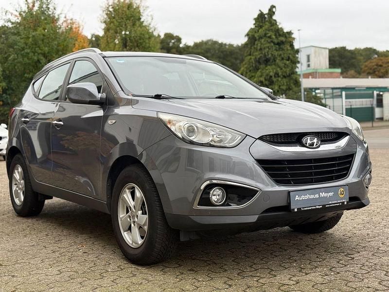 Grau Gebraucht 2013 Hyundai ix35 Edition SUV | 11.490 € (Fairer Preis) - Bild 1/4