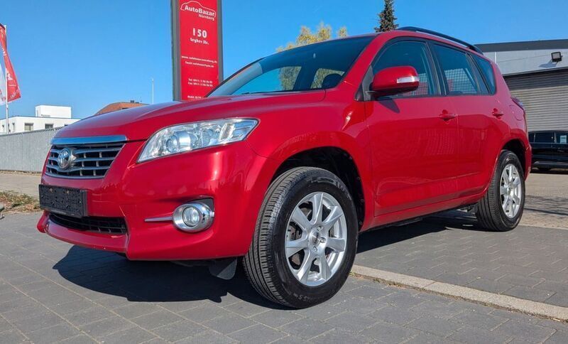 Red mica metallic Gebraucht 2011 Toyota RAV4 SUV | 11.900 € (Etwas zu teuer) - Bild 1/4