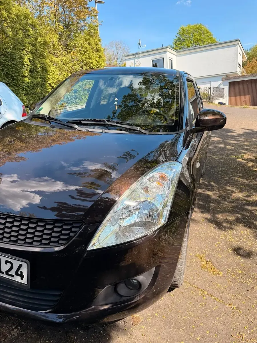 Gebraucht Suzuki Swift 94 PS (69 kW) 2013 Braun Kleinwagen