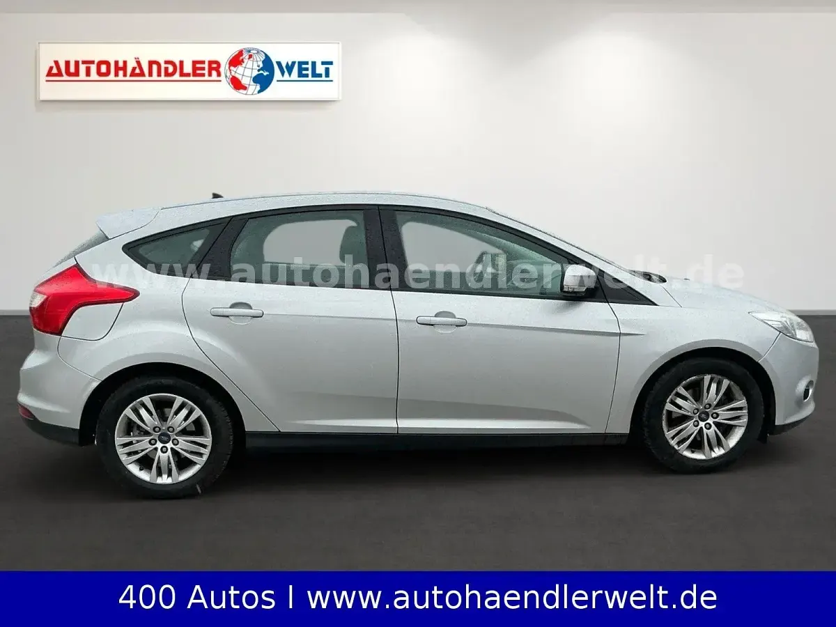 Używany Ford Focus 125 KM (91 kW) 2014 Srebrny Sedan/Limuzyna
