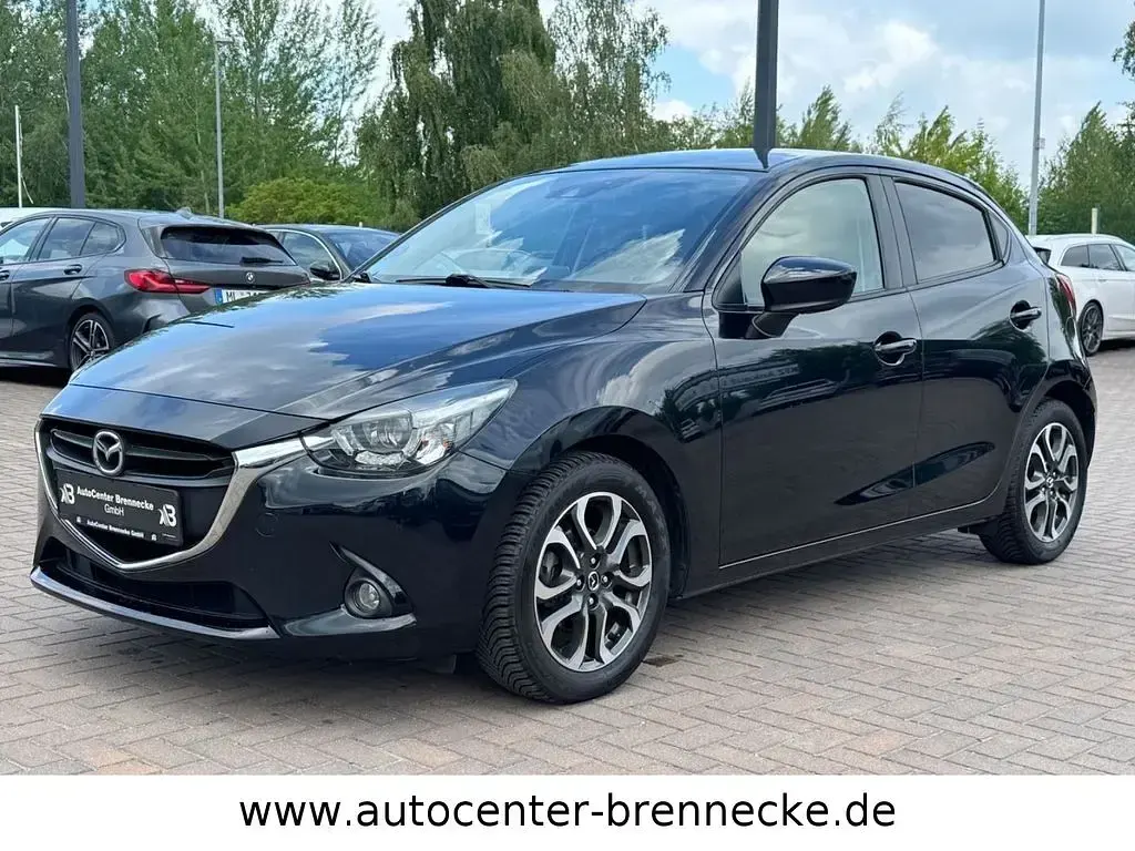 Używany Mazda 2 Nakama 90 KM (66 kW) 2016 Czarny Sedan/Limuzyna