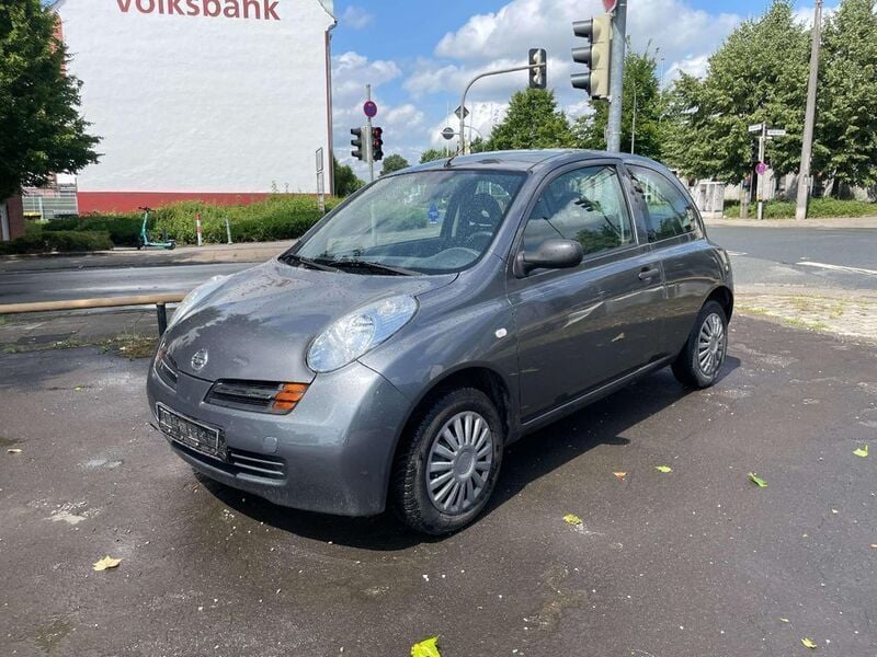 Grau Gebraucht 2004 Nissan Micra City Kleinwagen | 2.890 € (Fairer Preis) - Bild 1/4