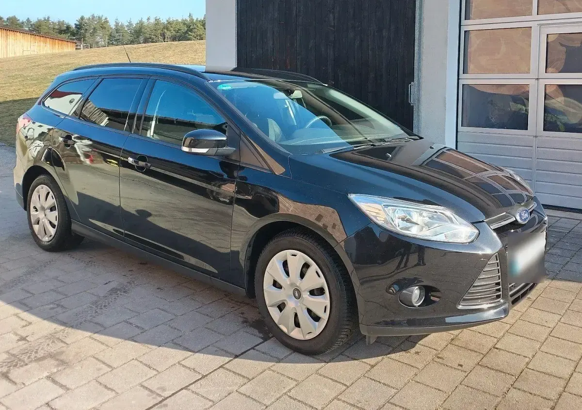 Używany Ford Focus 125 KM (91 kW) 2014 Czarny Kombi
