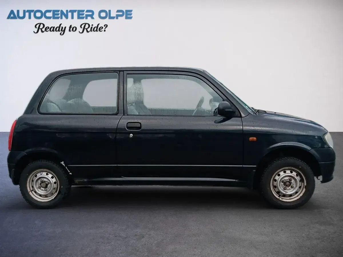 Gebraucht Daihatsu Cuore 56 PS (41 kW) 1999 Schwarz Kleinwagen