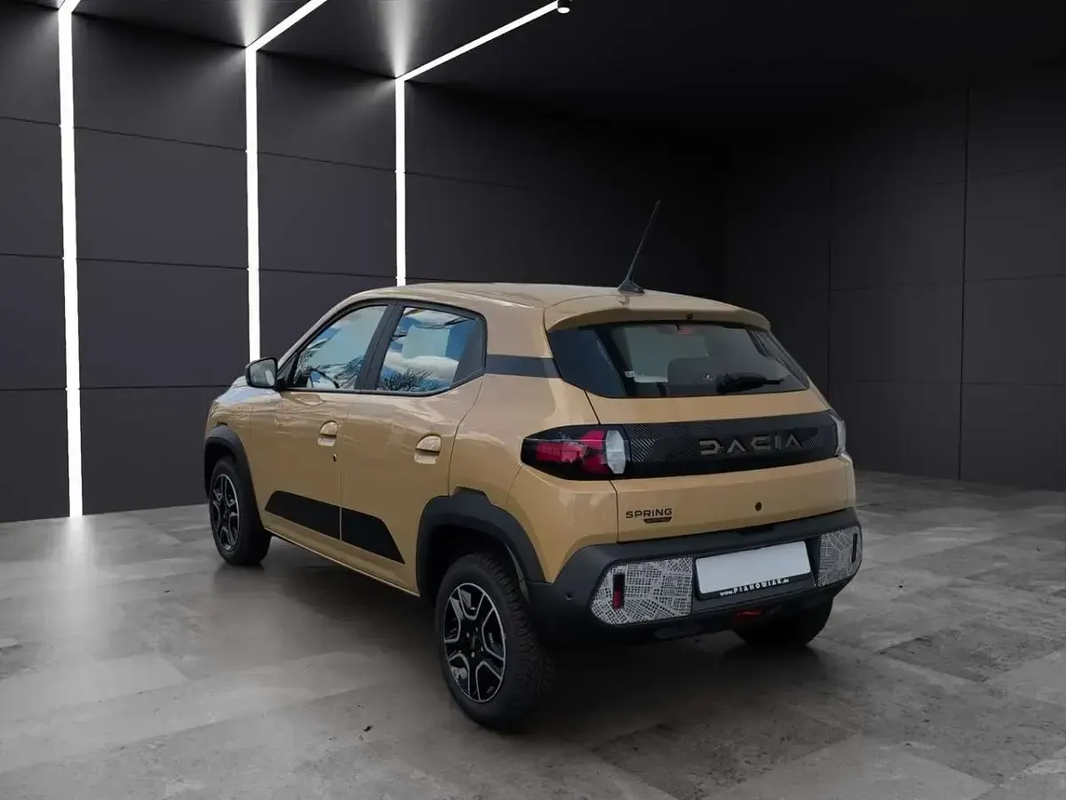 Używany Dacia Spring Extreme 47 kW (65 KM) 2024 Beżowy Hatchback