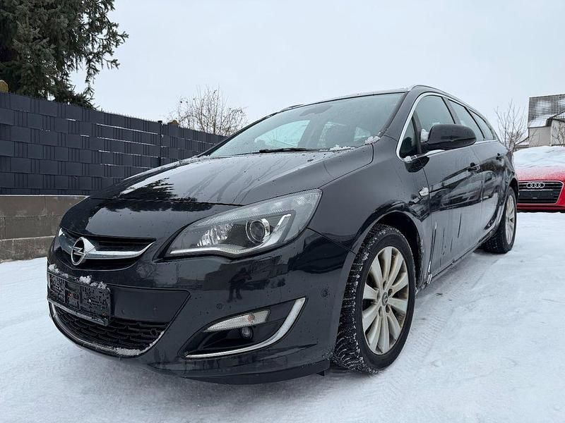 Schwarz Gebraucht 2015 Opel Astra Exklusiv Kombi | 3.499 € - Bild 1/4