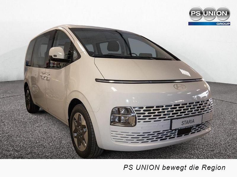 Creamy white Neu 2024 Hyundai Staria Prime Van | 46.450 € - Bild 1/4