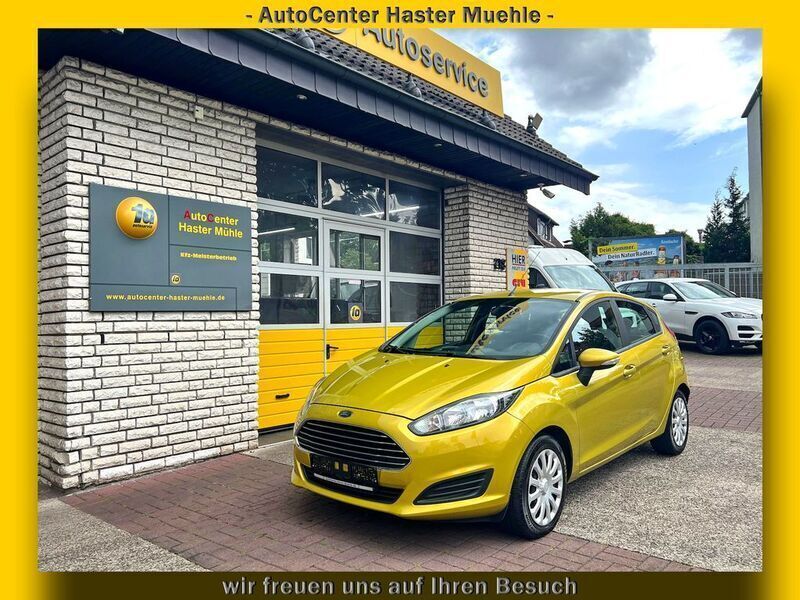 Gelb Gebraucht 2015 Ford Fiesta Trend Kleinwagen | 6.490 € (Fairer Preis) - Bild 1/4