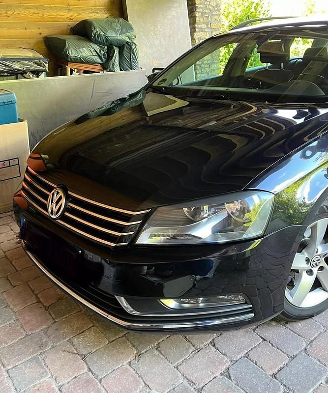 Second-hand VW Passat 140 CP (102 kW) 2013 Negru Break