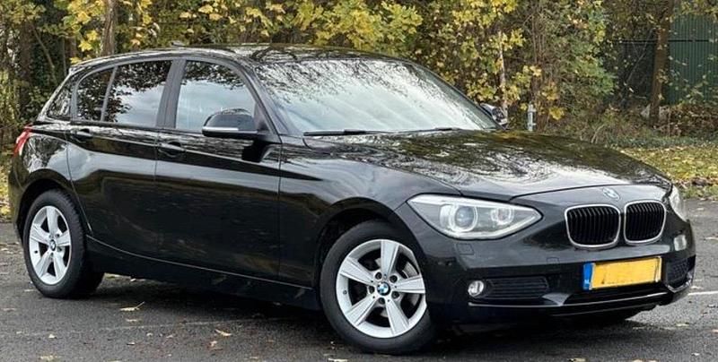 Schwarz Gebraucht 2014 BMW 116 Executive Kleinwagen | 7.590 € (Superpreis) - Bild 1/4