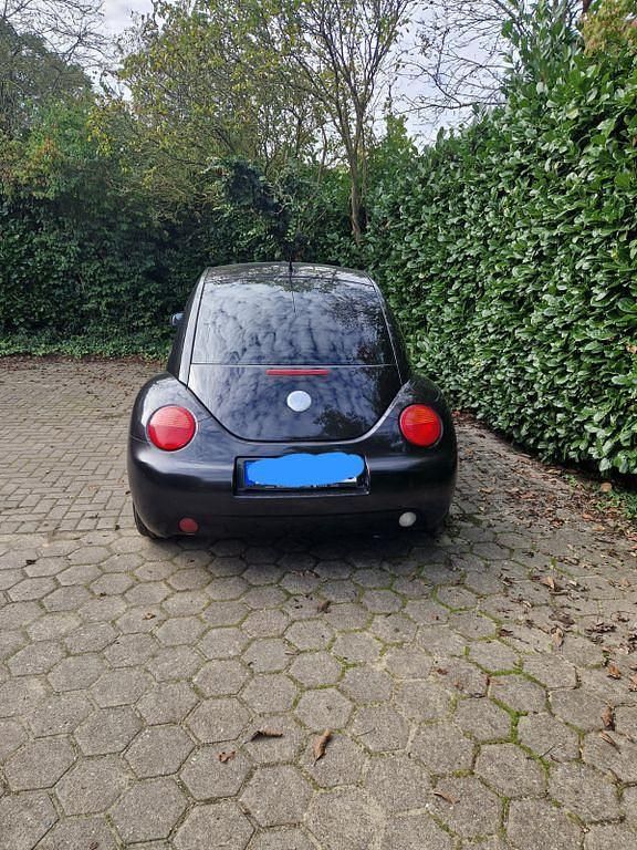 Gebraucht VW New Beetle 101 PS (74 kW) 2004 Schwarz Kleinwagen