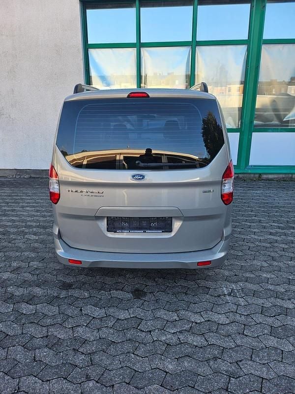 Gebraucht Ford Tourneo Courier 101 PS (74 kW) 2014 Gold Van / Kleinbus