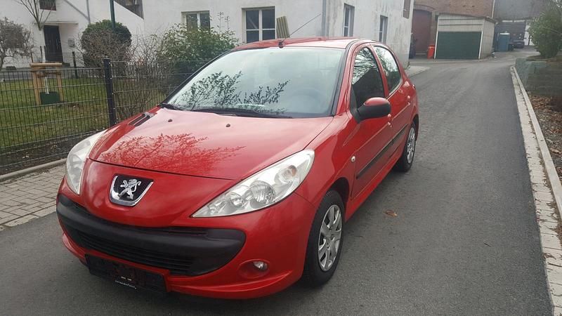 Gebraucht Peugeot 206+ 75 PS (55 kW) 2010 Rot Kleinwagen