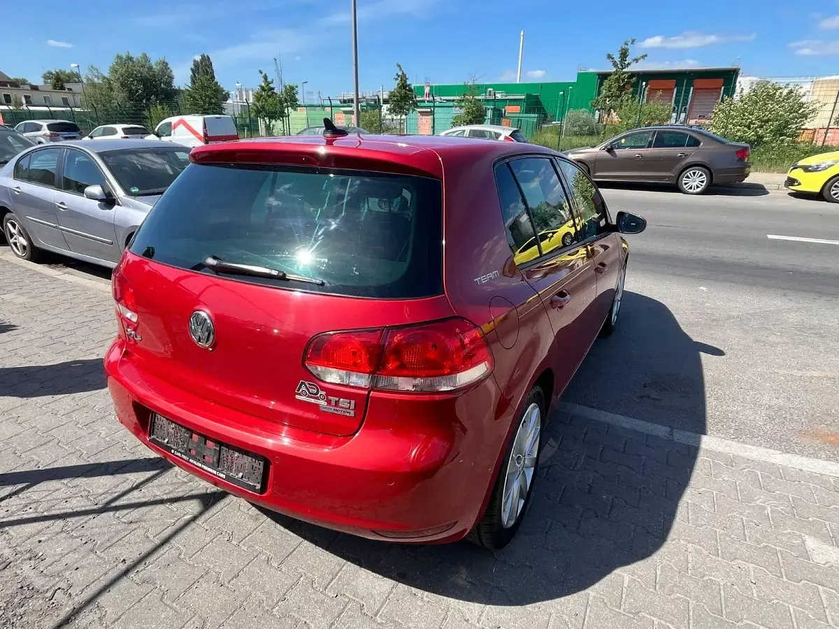 Gebraucht VW Golf VI Team 105 PS (77 kW) 2010 Orange Kleinwagen