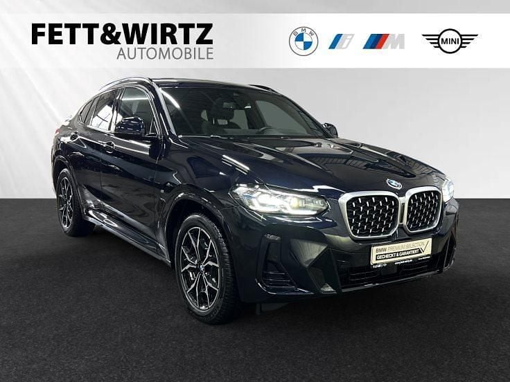 Carbonschwarz metallic Gebraucht 2024 BMW X4 M Sport SUV | 56.690 € (Superpreis) - Bild 1/3