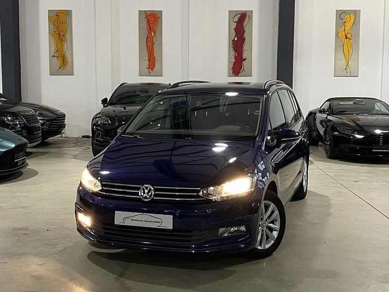 Atlantic blue Gebraucht 2016 VW Touran Comfortline Van / Kleinbus | 15.770 € (Fairer Preis) - Bild 1/4