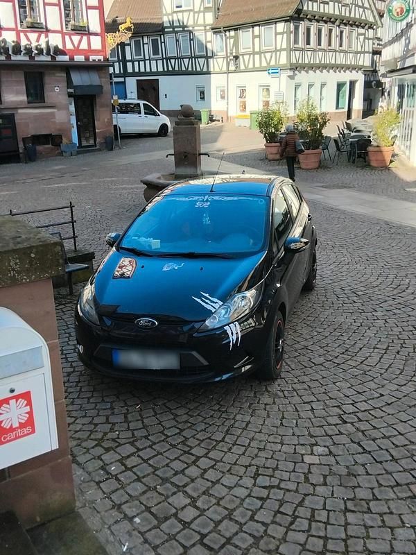 Gebraucht Ford Fiesta 80 PS (58 kW) 2010 Schwarz Kleinwagen